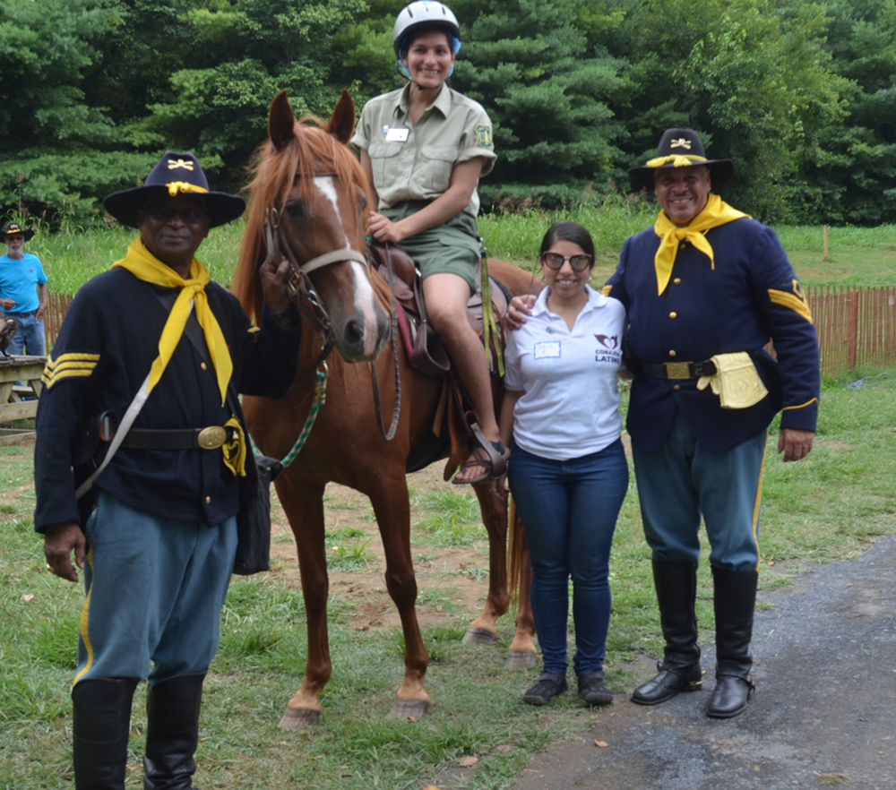 Buffalo Soldiers teaching horseback riding basics!