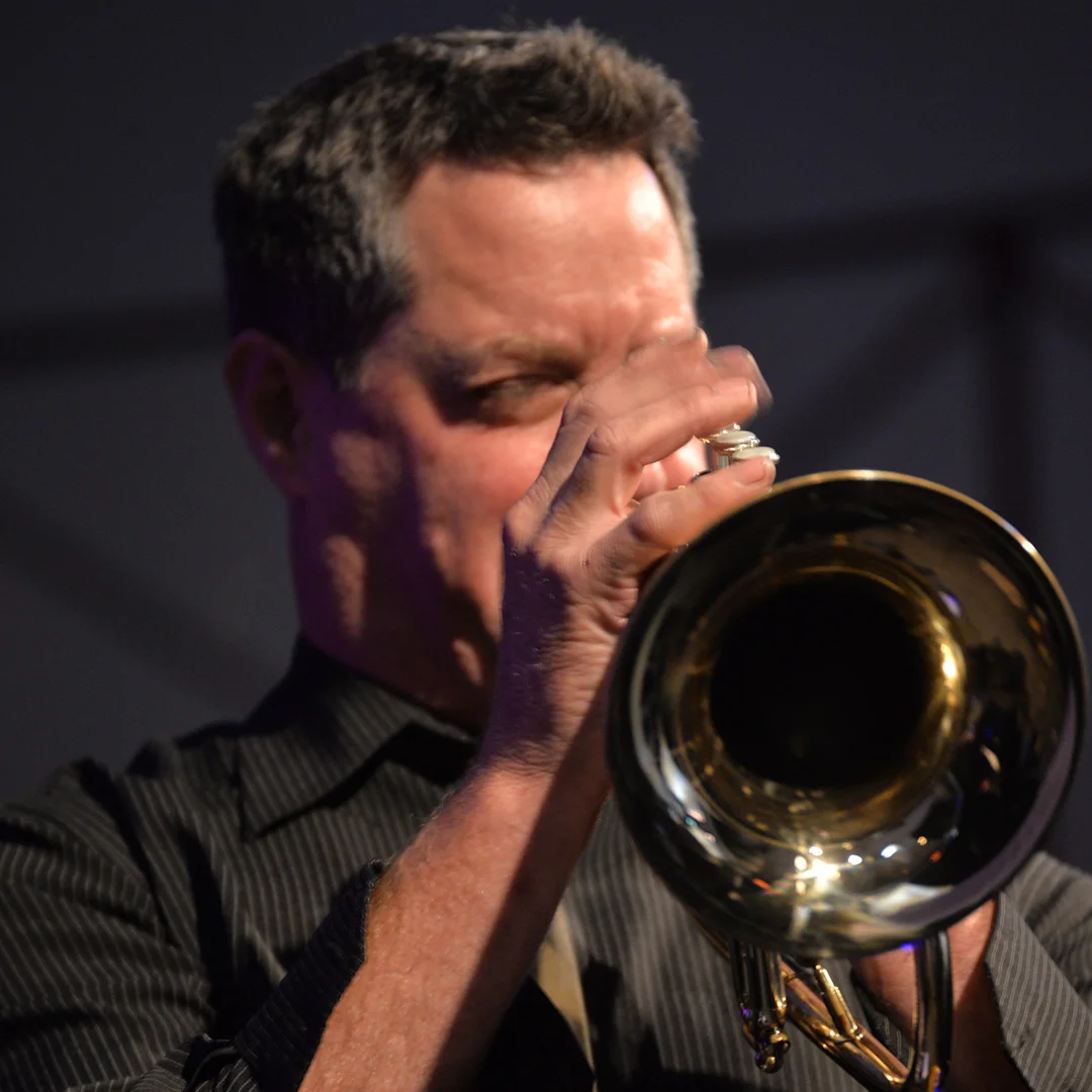 Man blasting trumpet