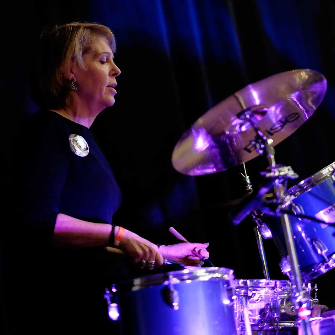 Woman drumming