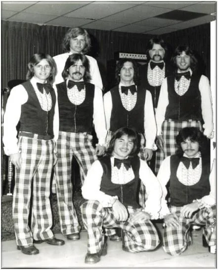 Even in the 70s, these outfits were a bit over the top. Ten points if you can find me in this photo. (Leave your guess in the comment section below.)