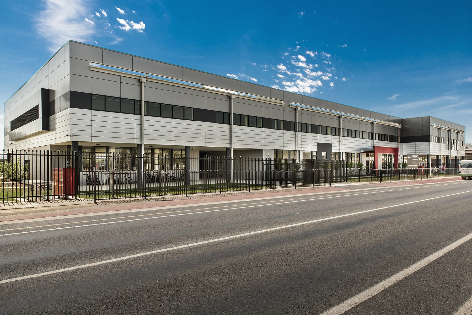Originally engaged as Project Managers to oversee the construction of the new Regeneration Project at Wodonga Senior Secondary College, Bryant Alsop was engaged as architects to re-design the science laboratories to meet contemporary teaching expectations as well as current standards and WH&S requirements. 5 general laboratories were designed for physics, chemistry and general science; as well as a ‘super lab’ for focussed teaching of smaller groups. Back-of-house spaces including preparation spaces, staff desks and chemical storage were included. The design focussed on creating open, accessible work areas with clear visual connection to demonstration benches and fume cupboards from all spaces, as well as visual connections between adjacent learning areas. The interior design continued the strong colour language of the building we had developed, with sharp accents off-setting a more muted work area. Coat cupboards in orange continue this theme, maintaining a consistent graphic throughout the rooms.