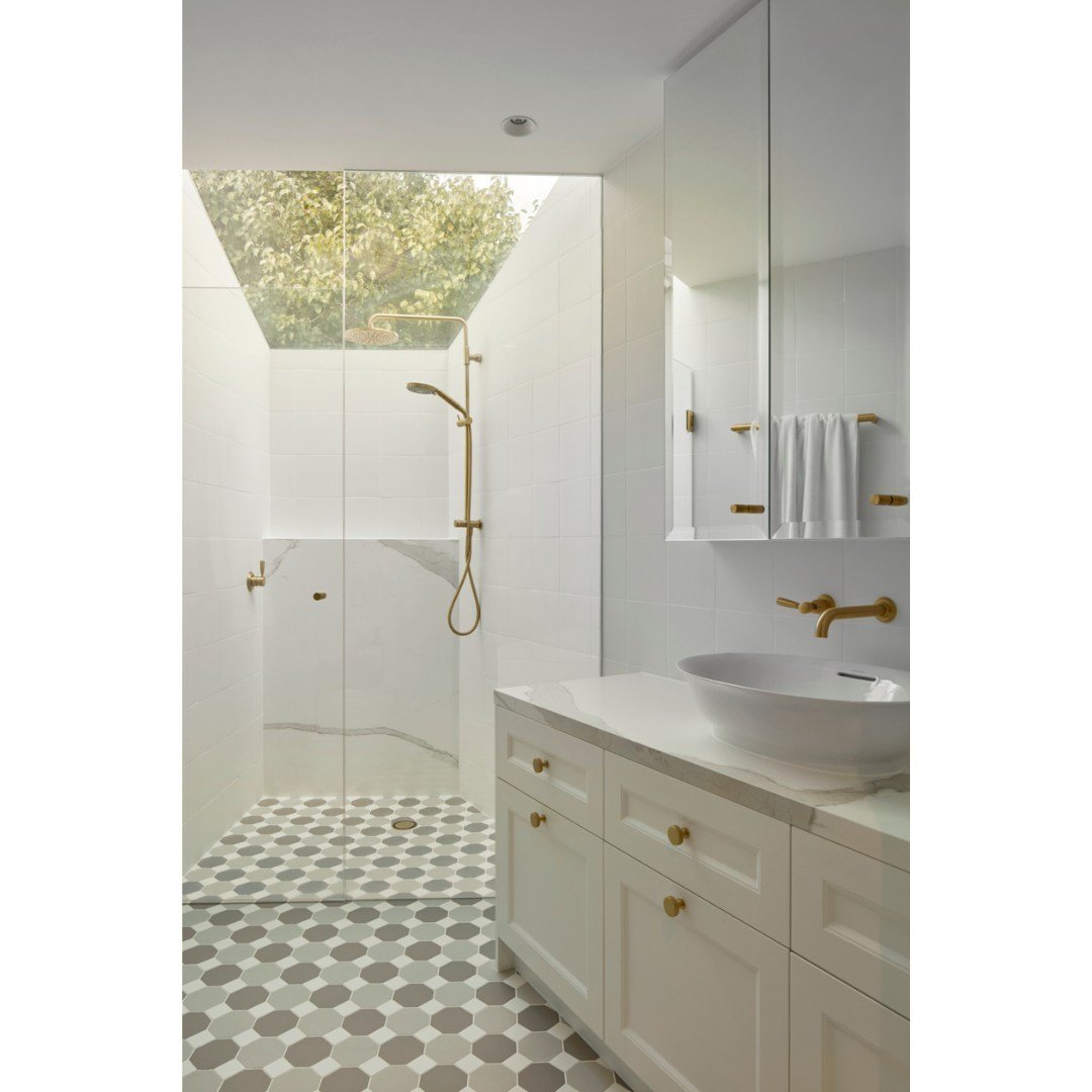 Feels like showering in the great outdoors! This gorgeous walk-in shower with a fully glazed roofline brings nature indoors for the perfect start to your day. Natural light, tree canopy views, and sleek design creates a truly spa-like experience in t