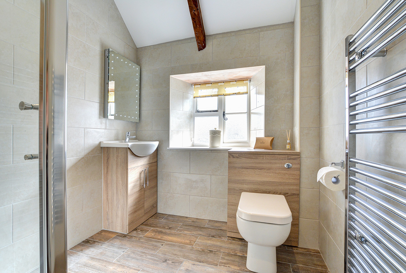 The bathroom of Otterbridge luxury self catering converted barn holiday cottage at Penrose Burden in North Cornwall01.jpg