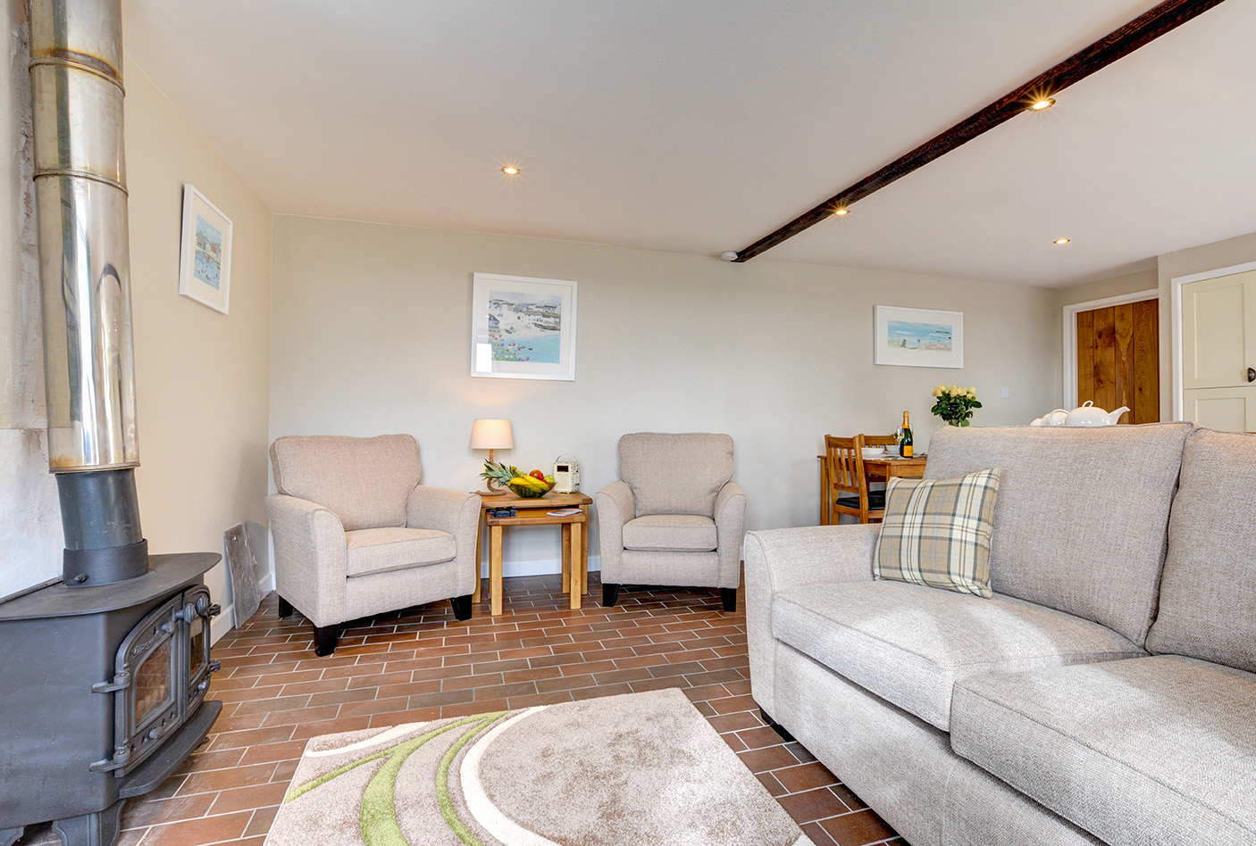 The lounge of Butterwell luxury self catering converted barn holiday cottage at Penrose Burden in North Cornwall 01.jpg