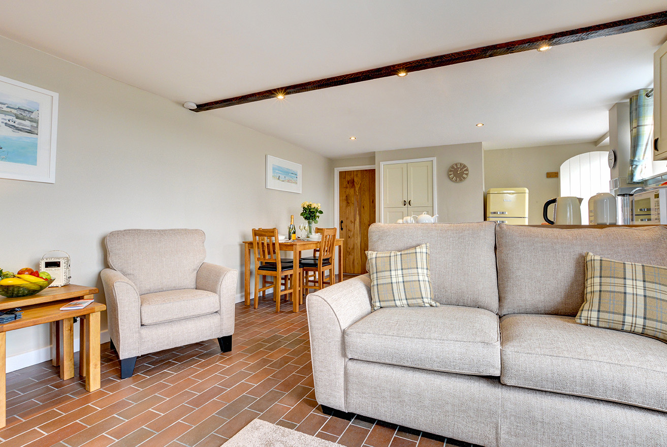 The lounge of Butterwell luxury self catering converted barn holiday cottage at Penrose Burden in North Cornwall 03.jpg