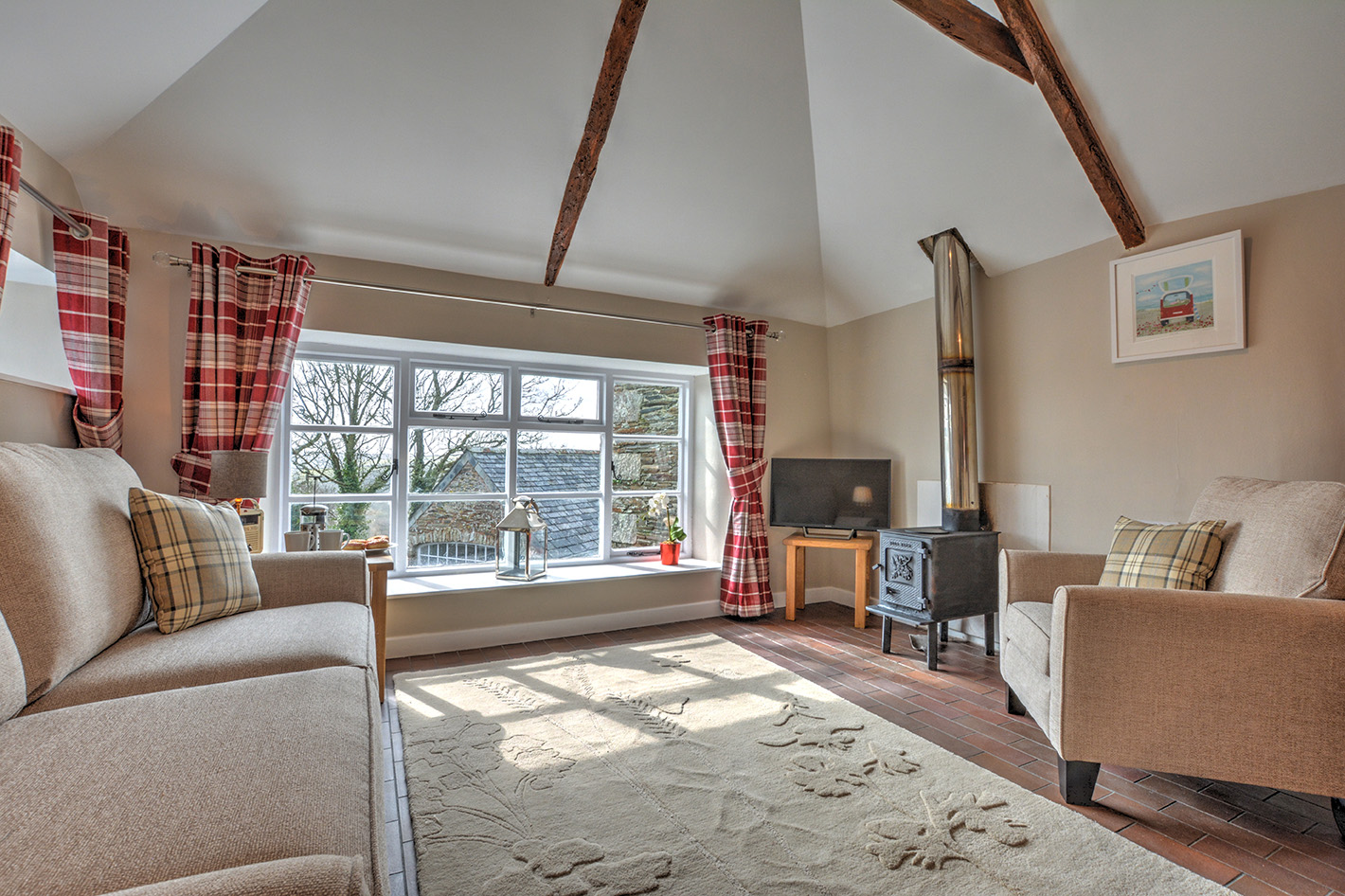 The lounge area of Goosehill luxury self catering converted barn holiday cottage at Penrose Burden in North Cornwall 01.jpg