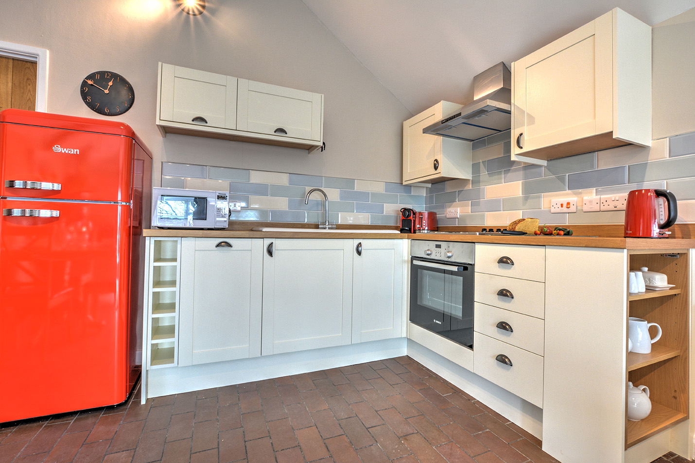 The kitchen of Goosehill luxury self catering converted barn holiday cottage at Penrose Burden in North Cornwall 01.jpg