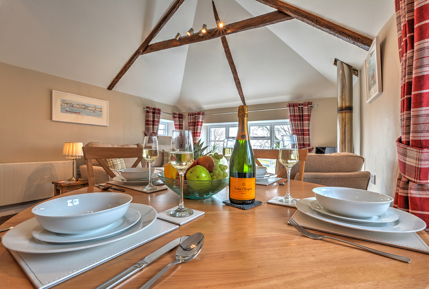 The dining area of Goosehill luxury self catering converted barn holiday cottage at Penrose Burden in North Cornwall 02.jpg