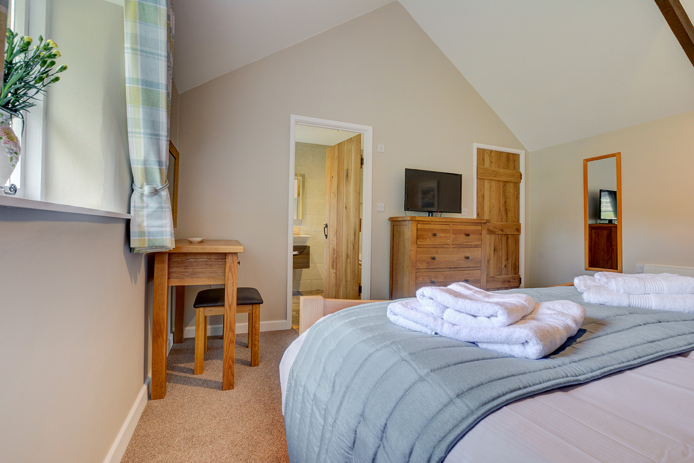 The second bedroom of Goosehill luxury self catering converted barn holiday cottage at Penrose Burden in North Cornwall 03.jpg