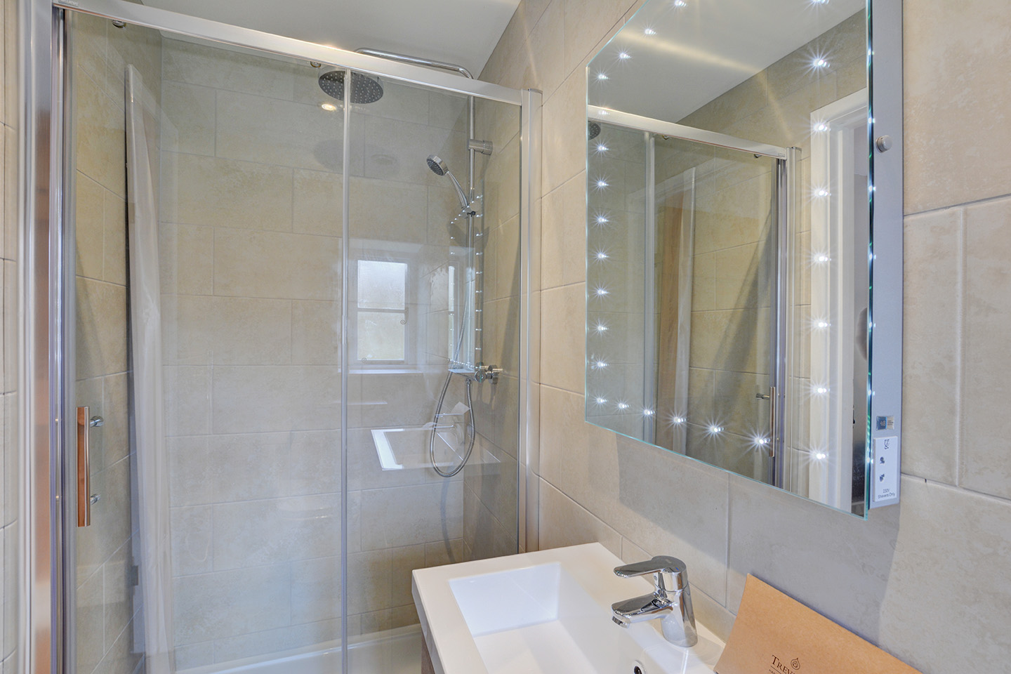 The en-suite shower room of Goosehill luxury self catering converted barn holiday cottage at Penrose Burden in North Cornwall 02.jpg