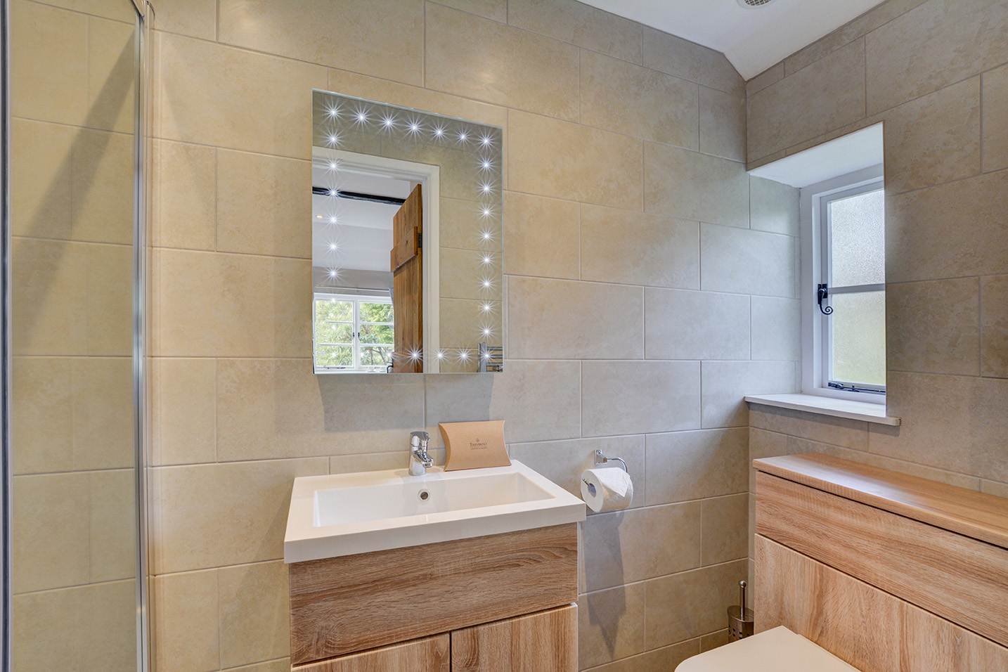 The en-suite shower room of Goosehill luxury self catering converted barn holiday cottage at Penrose Burden in North Cornwall 01.jpg