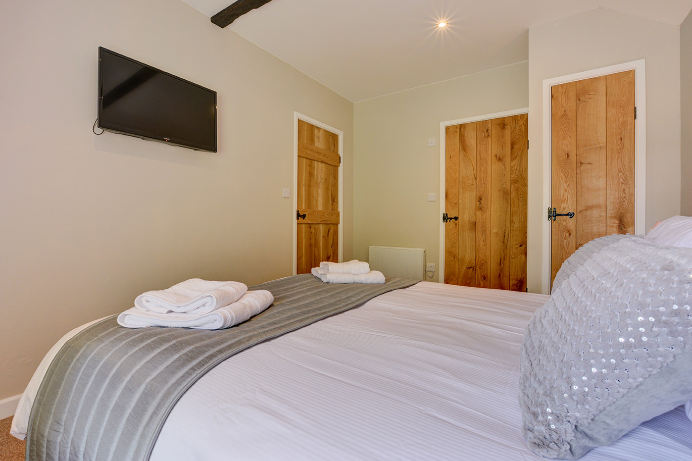 The first bedroom of Goosehill luxury self catering converted barn holiday cottage at Penrose Burden in North Cornwall 03.jpg