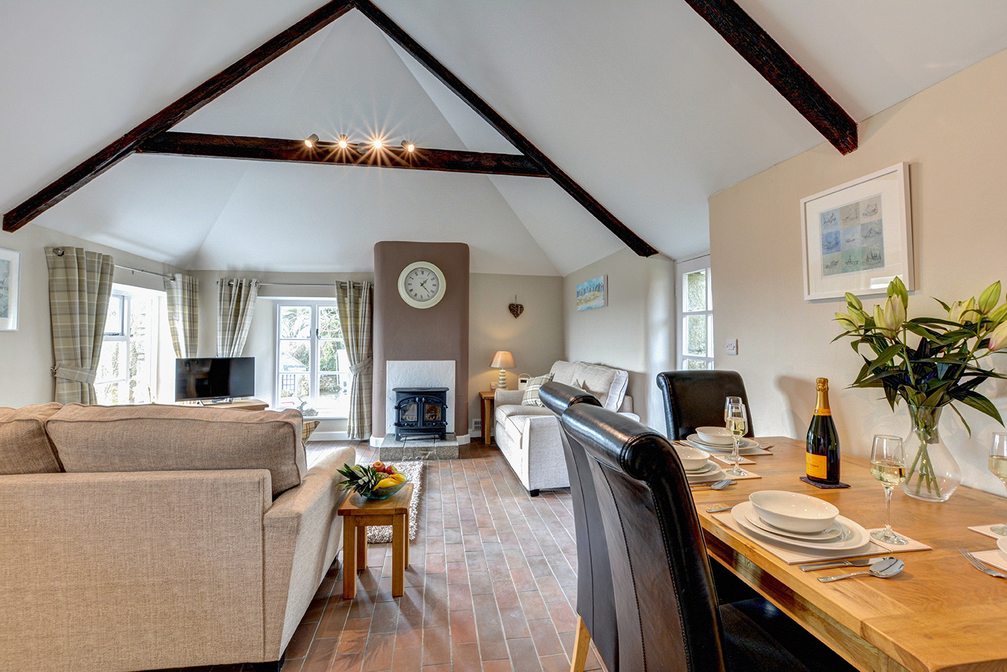 The dining area of Otterbridge luxury self catering converted barn holiday cottage at Penrose Burden in North Cornwall.jpg