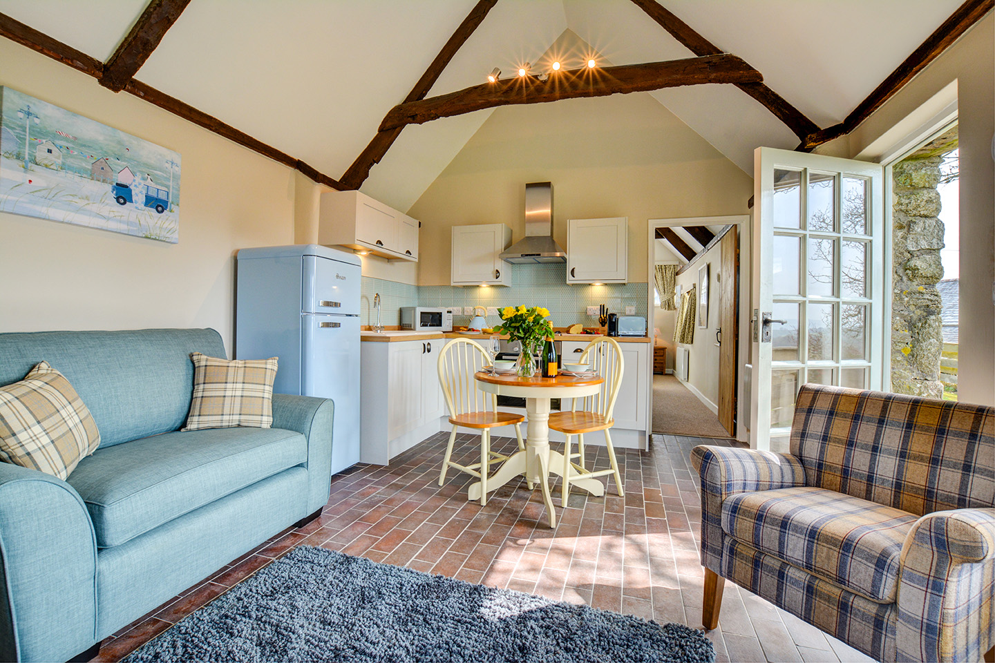 The lounge kitchen diner at Jingles luxury self catering holiday cottage at Penrose Burden in North Cornwall near Bodmin Moor01.jpg