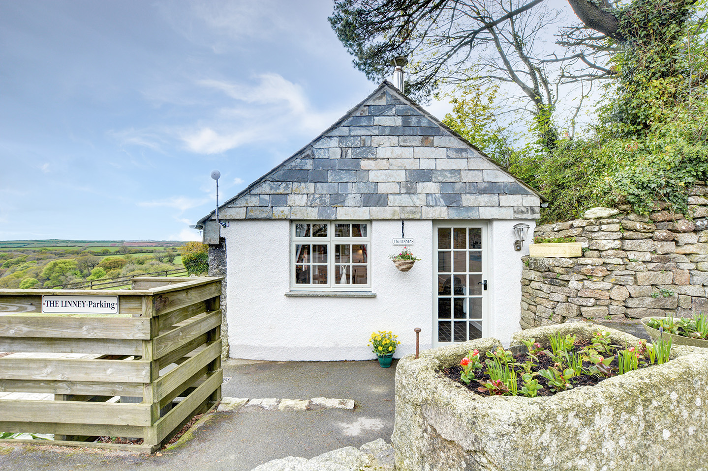The outside of The Linney self catering cottage converted barn at Penrose Burden holiday cottages in Cornwall.jpg