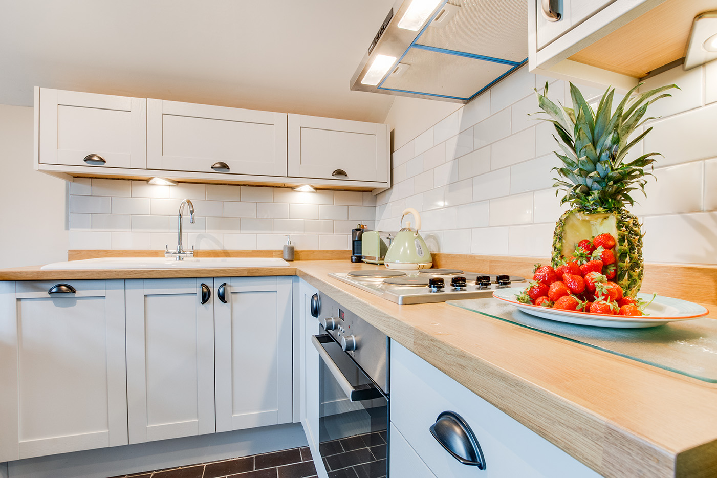 The kitchen area of Snappers luxury self catering converted barn holiday cottage at Penrose Burden in North Cornwall 01.jpg