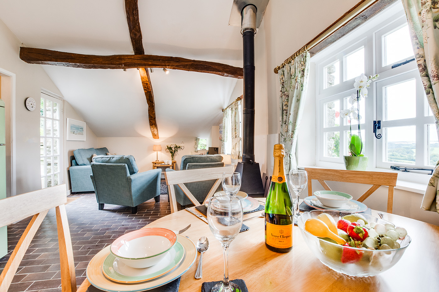 The dining area of Snappers luxury self catering converted barn holiday cottage at Penrose Burden in North Cornwall 01.jpg