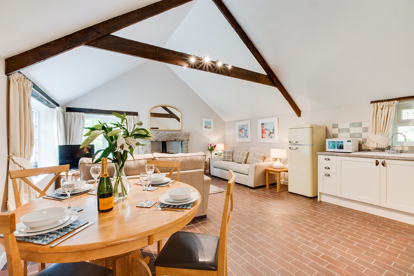 The dining area of Troutstream luxury self catering converted barn holiday cottage at Penrose Burden in North Cornwall 01.jpg