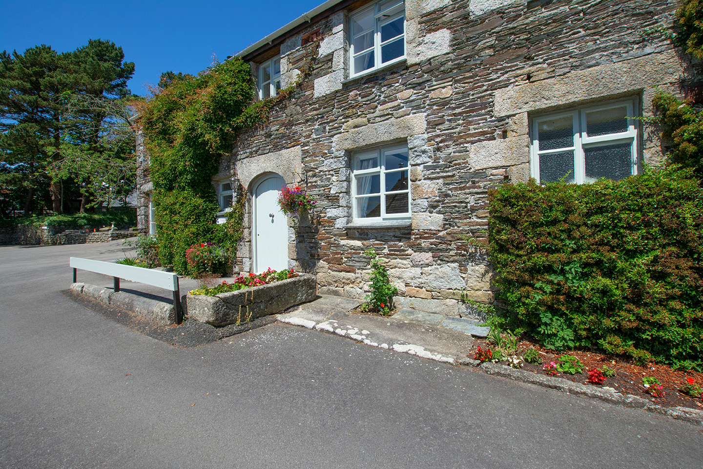 The exterior of Butterwell luxury self catering converted barn holiday cottage at Penrose Burden in North Cornwall 01.jpg