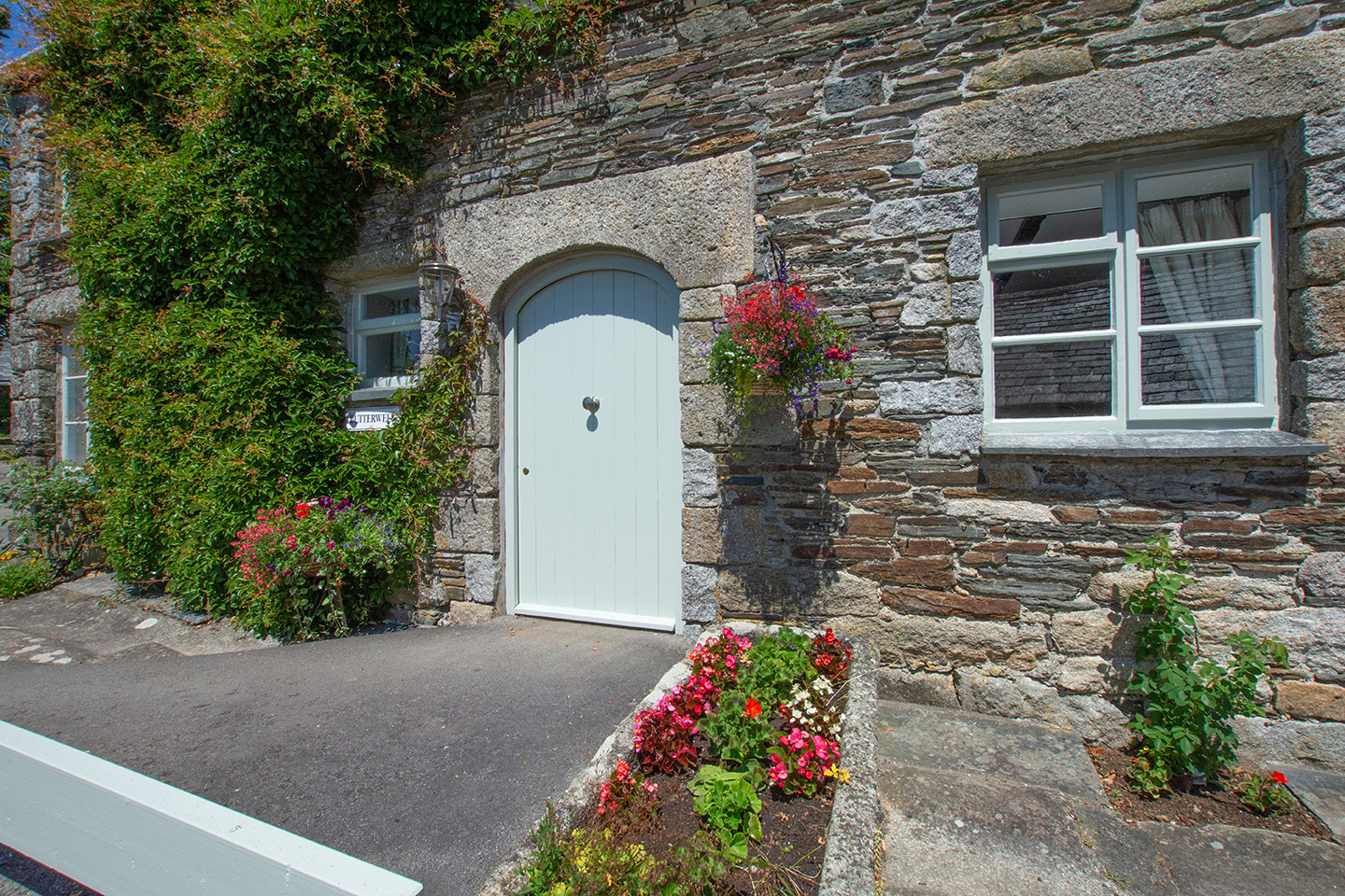 The exterior of Butterwell luxury self catering converted barn holiday cottage at Penrose Burden in North Cornwall 02.jpg