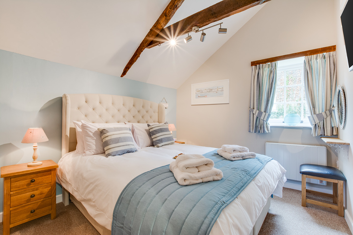 The master bedroom of Snappers luxury self catering converted barn holiday cottage at Penrose Burden in North Cornwall 01.jpg