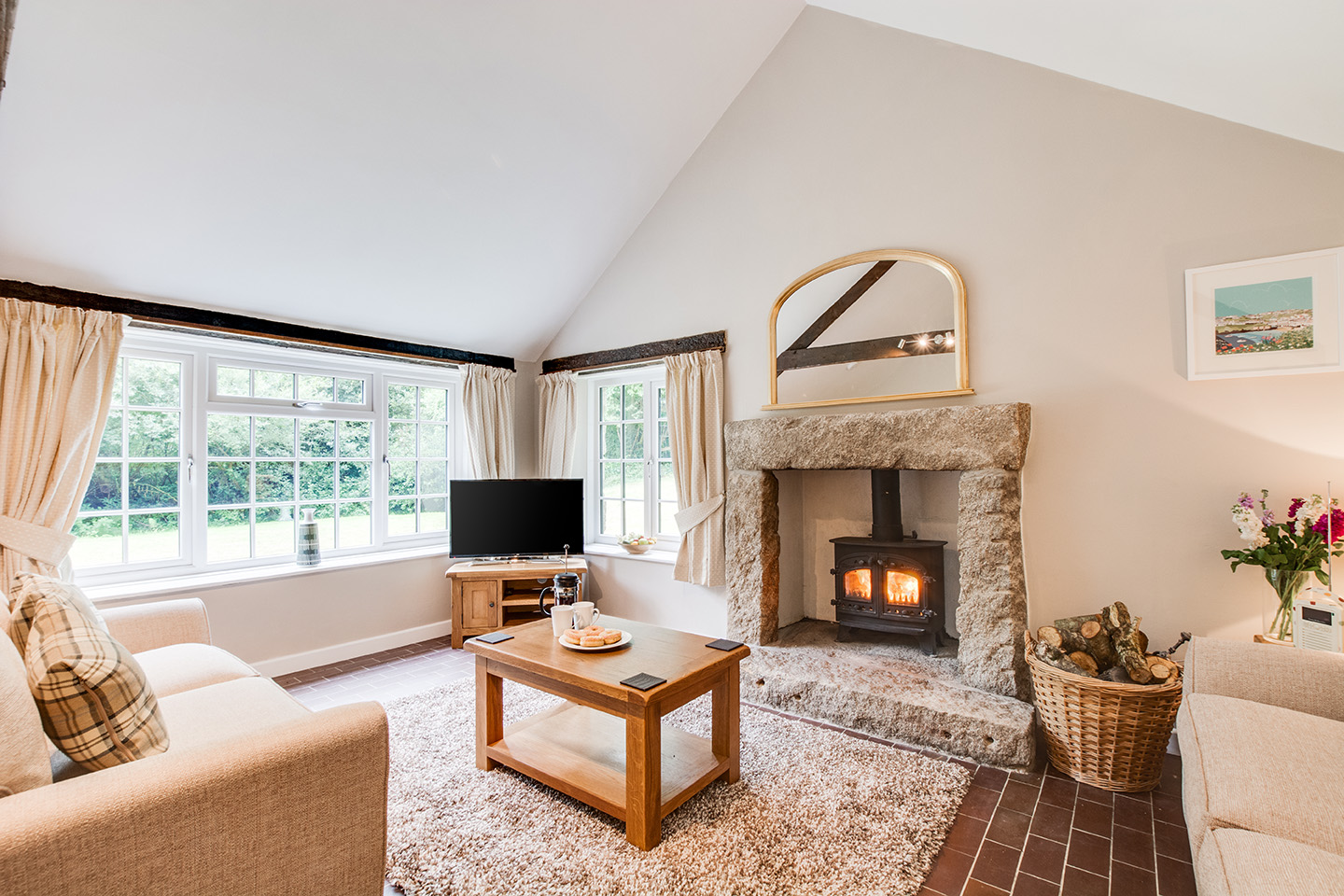 The lounge area of Troutstream luxury self catering converted barn holiday cottage at Penrose Burden in North Cornwall 01.jpg