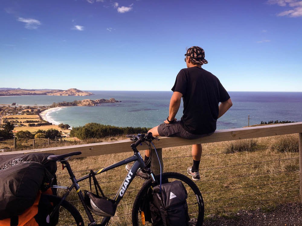 enjoying a scenic overlook while bikepacking