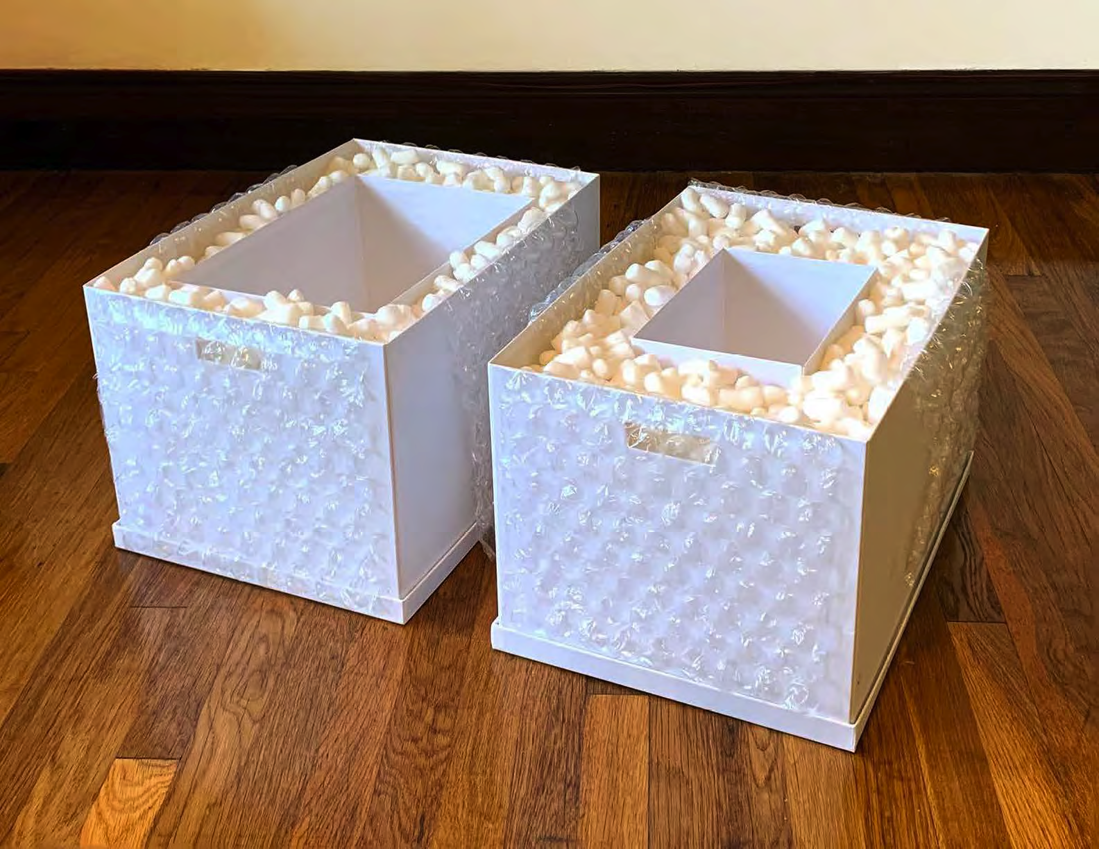  2019. Cardboard boxes, biodegradable packing peanuts, plastic bubble wrap. Each 20” x 12” x 14” 