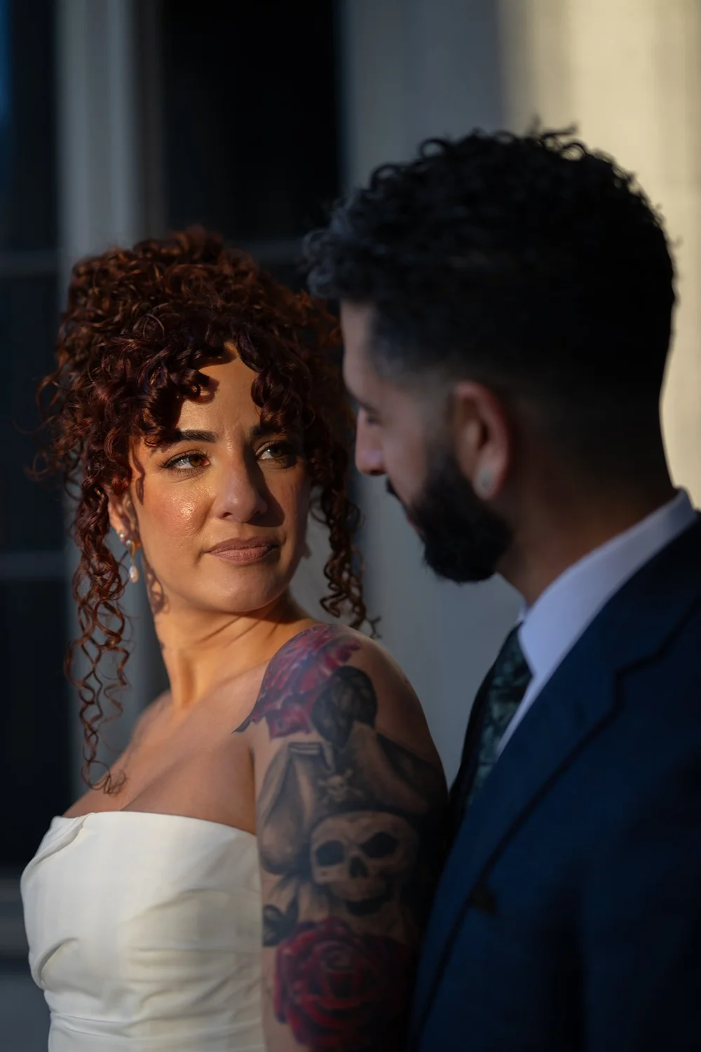 Close portrait of the bride and groom cheek to cheek