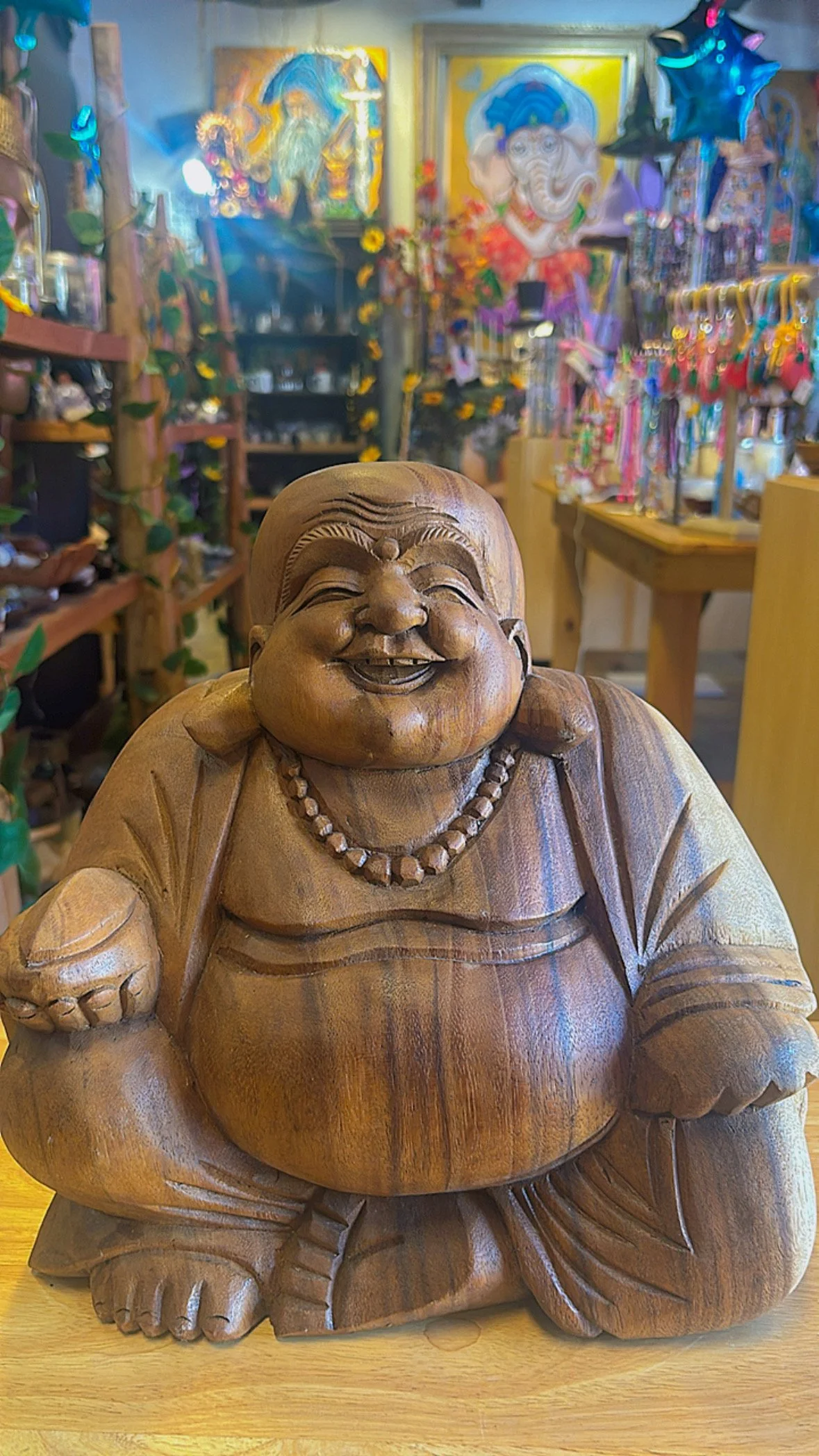 hand-carved-laughing-buddha