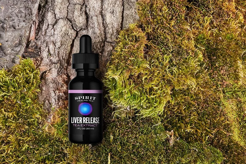Liver-Release-Tea-Extract-Bottle-on-Tree-Bark.jpg