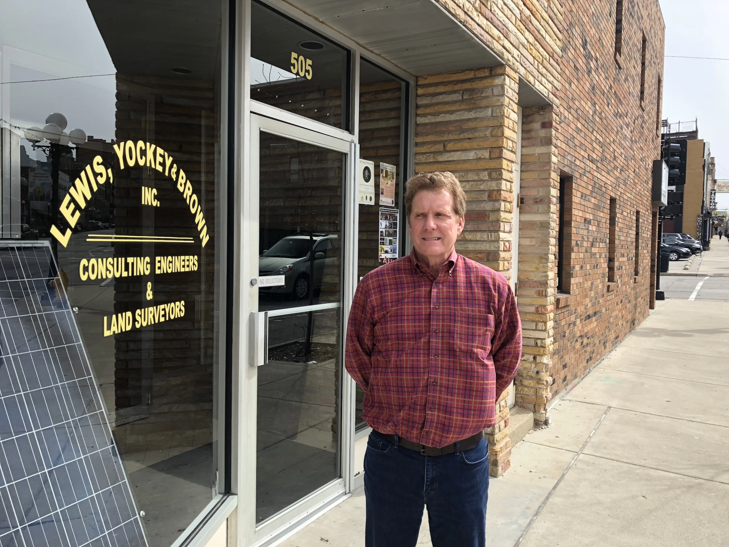 David Brown, President of Lewis, Yockey & Brown, Inc., poses outside the civil engineering firm's office, which has been in the same location since 1983. (Image credit: Erik Prenzler)