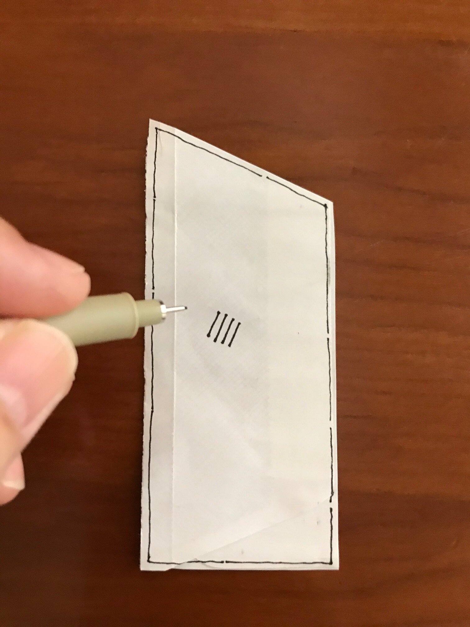  Draw 4 short parallel strokes evenly spaced apart. Take your time, focus on the starting and stopping of each line as you draw.  