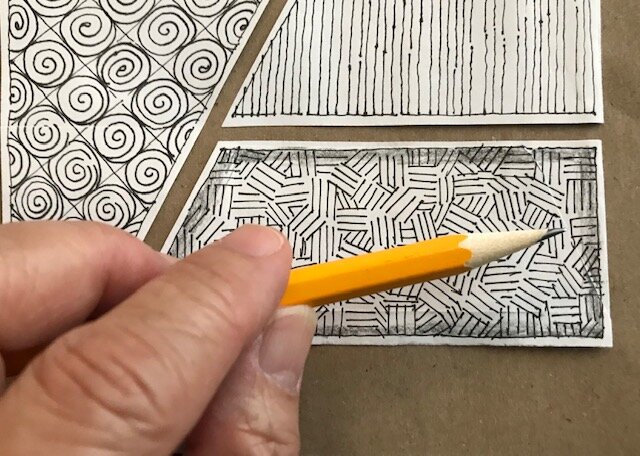  Let’s add some shading, using the side of your pencil. I hold my pencil sideways for shading. The essence of shading is to have contrast, so make sure you leave areas that don’t have graphite. Add graphite around the borders of your section. 