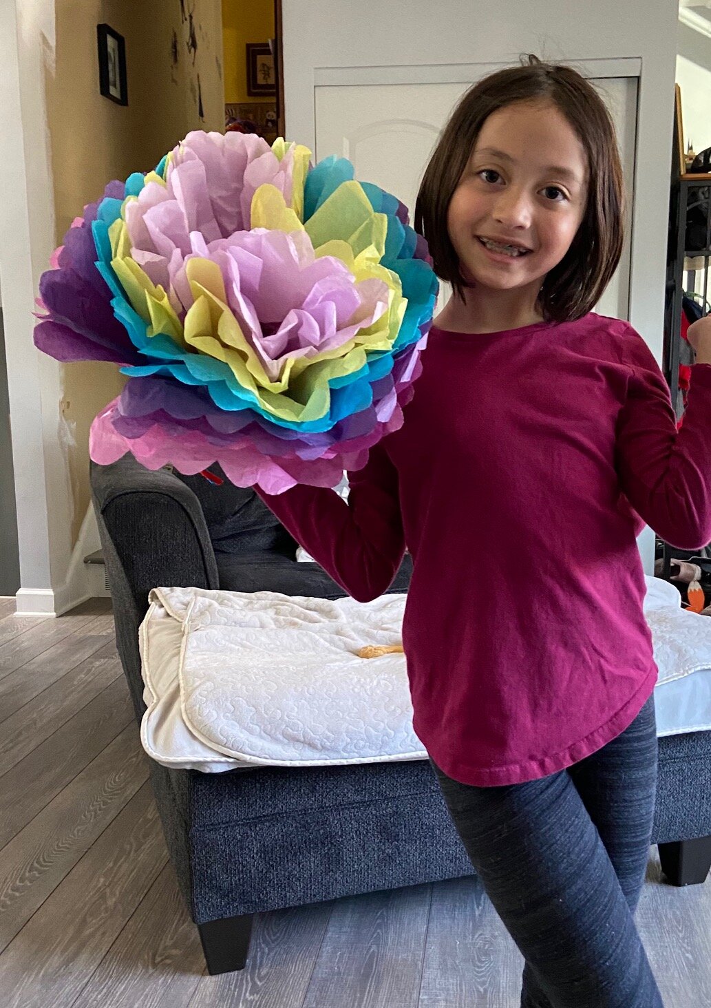  My niece used full sized tissue wrapping paper, and altered the colors. We cut a scallop (half circle) on the edges. So pretty! Thanks for your help! Enjoy, decorate your home…another project coming soon! 