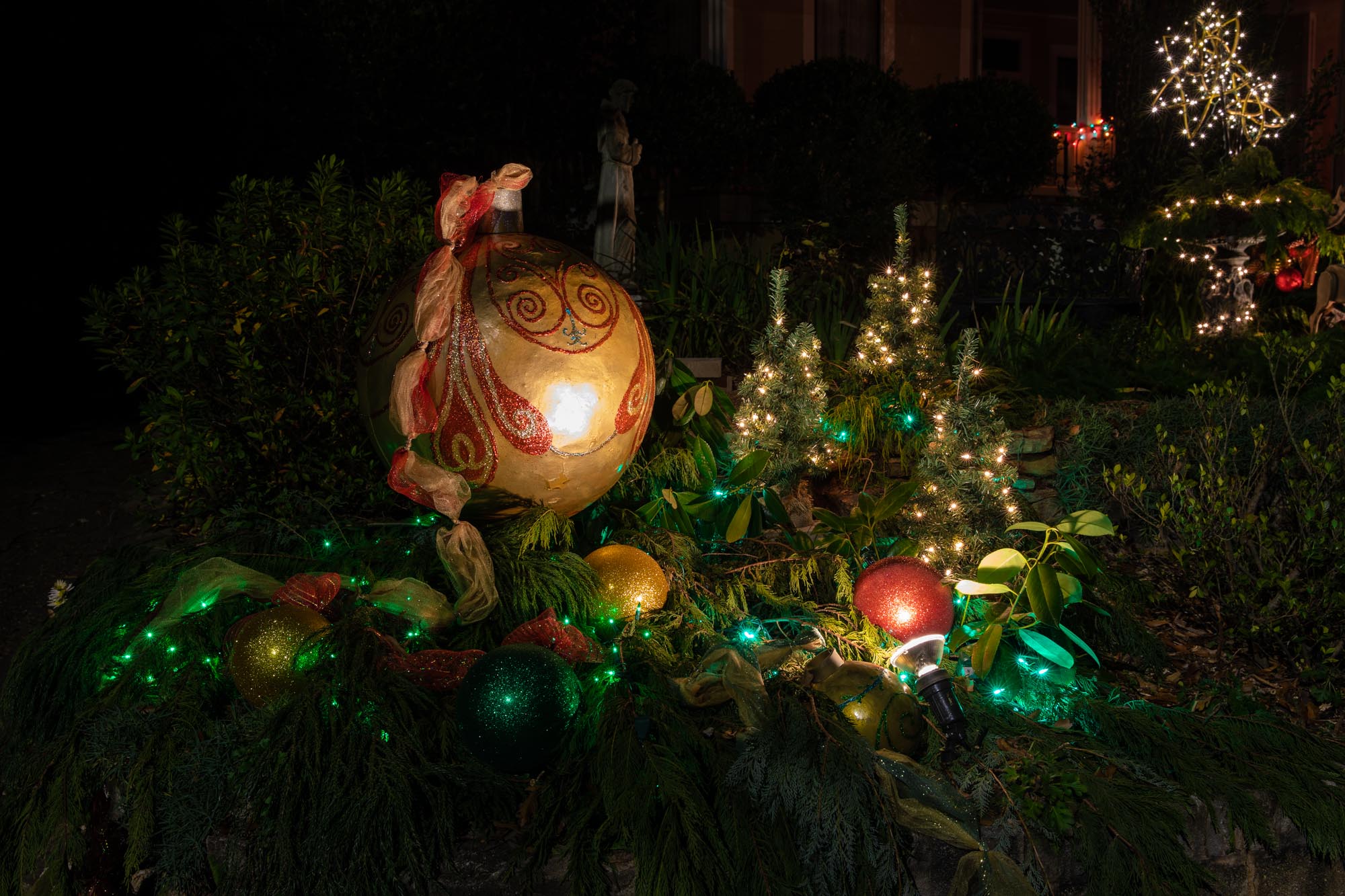 This home owner is extremely creative but they have huge crape myrtle trees in front of their home which makes it difficult to photograph so i chose these ornaments to represent their display.
