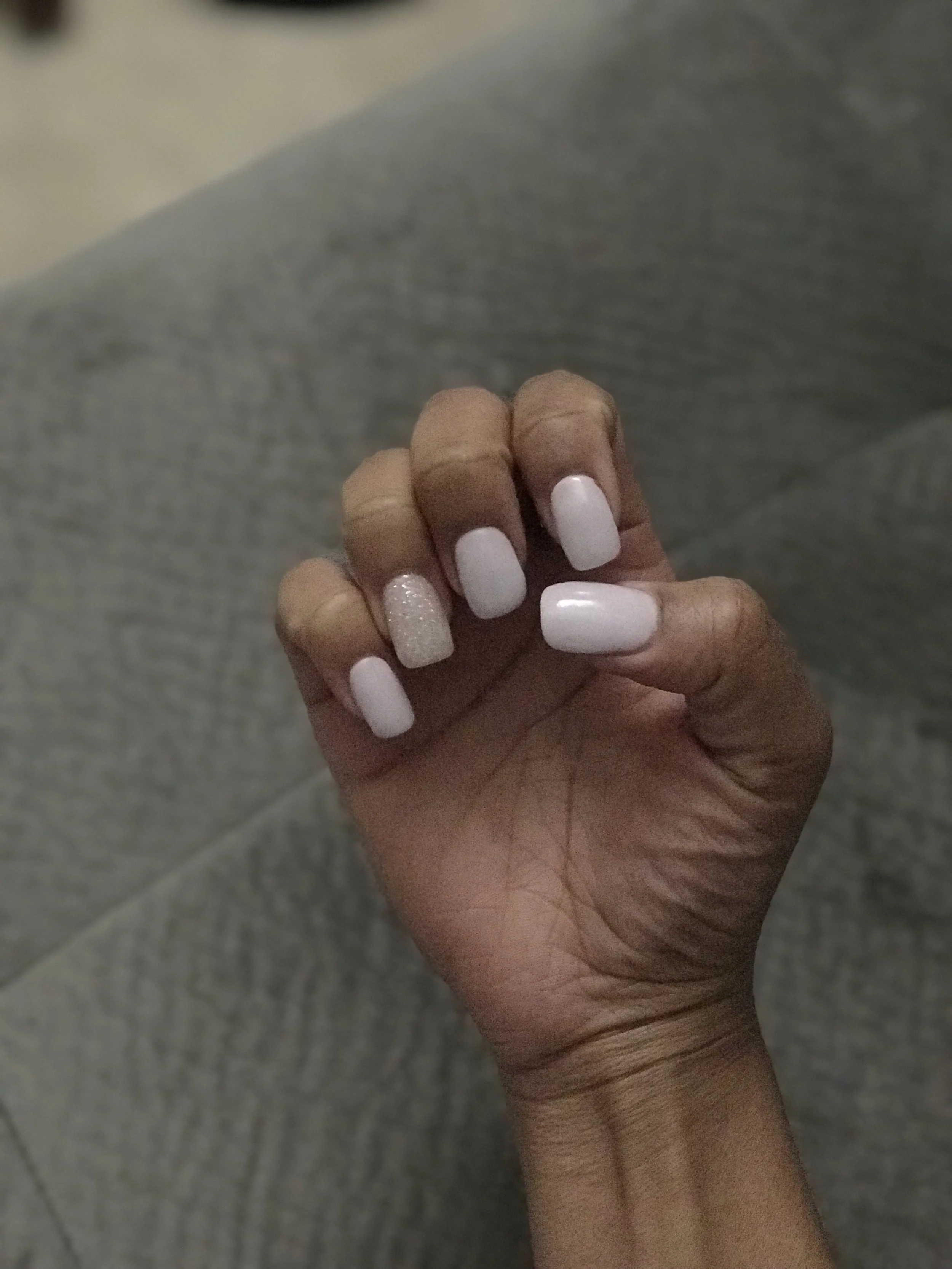 This is a SNS fill in, and it doesn't look super thick, thank goodness.