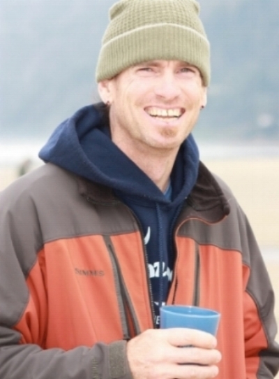 Dan, enjoying a cup, during river downtime