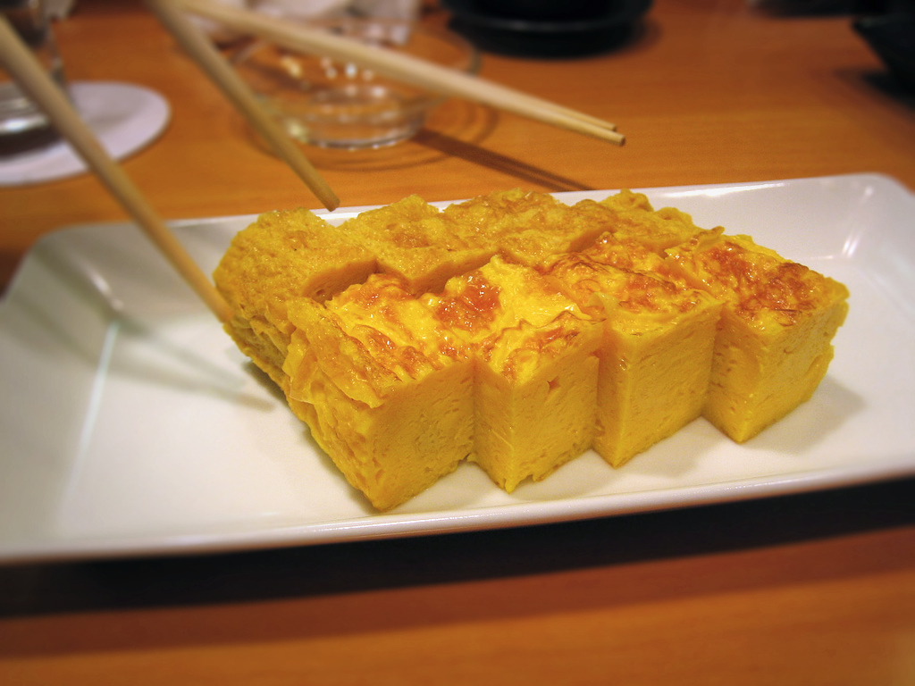 Tamagoyaki is a type of omelette made by rolling together several layers of cooked egg.