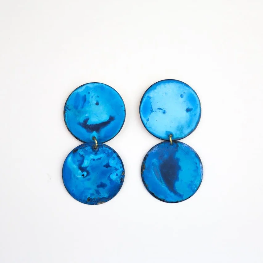 made by hand in new orleans, LA with brass, patina cobalt blue, swinging circle earrings available in at Wares in Beacon NY and to shop online now