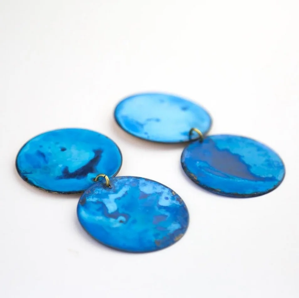 made by hand in new orleans, LA with brass, patina cobalt blue, swinging circle earrings available in at Wares in Beacon NY and to shop online now