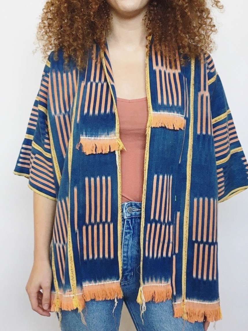 Copy of indigo and orange ikat tassel jacket handmade with vintage textile heritage fabrics handwoven by Mira Blackman in Oakland CA and available at Wares the shop in Beacon NY shop online now one of a kind