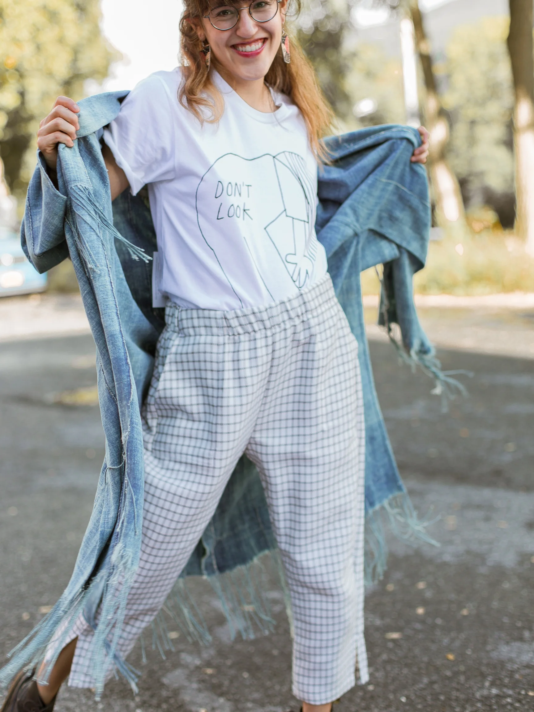 vintage handwoven heritage textiles made in Oakland CA by Mira Blackman one of a kind indigo tassel coat available at Wares in Beacon NY and to shop online now denim