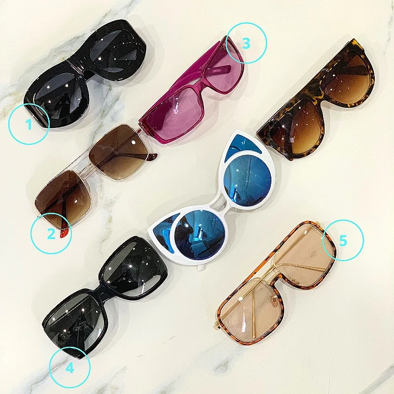 1 / Thick Black, TOM FORD. 2 / Sepia Square, NUWE BOUTIQUE. 3 / Pink, GUCCI. 4 / Black Square, STELLA McCARTNEY. 5 / Tortoiseshell, PRETTY LITTLE THING