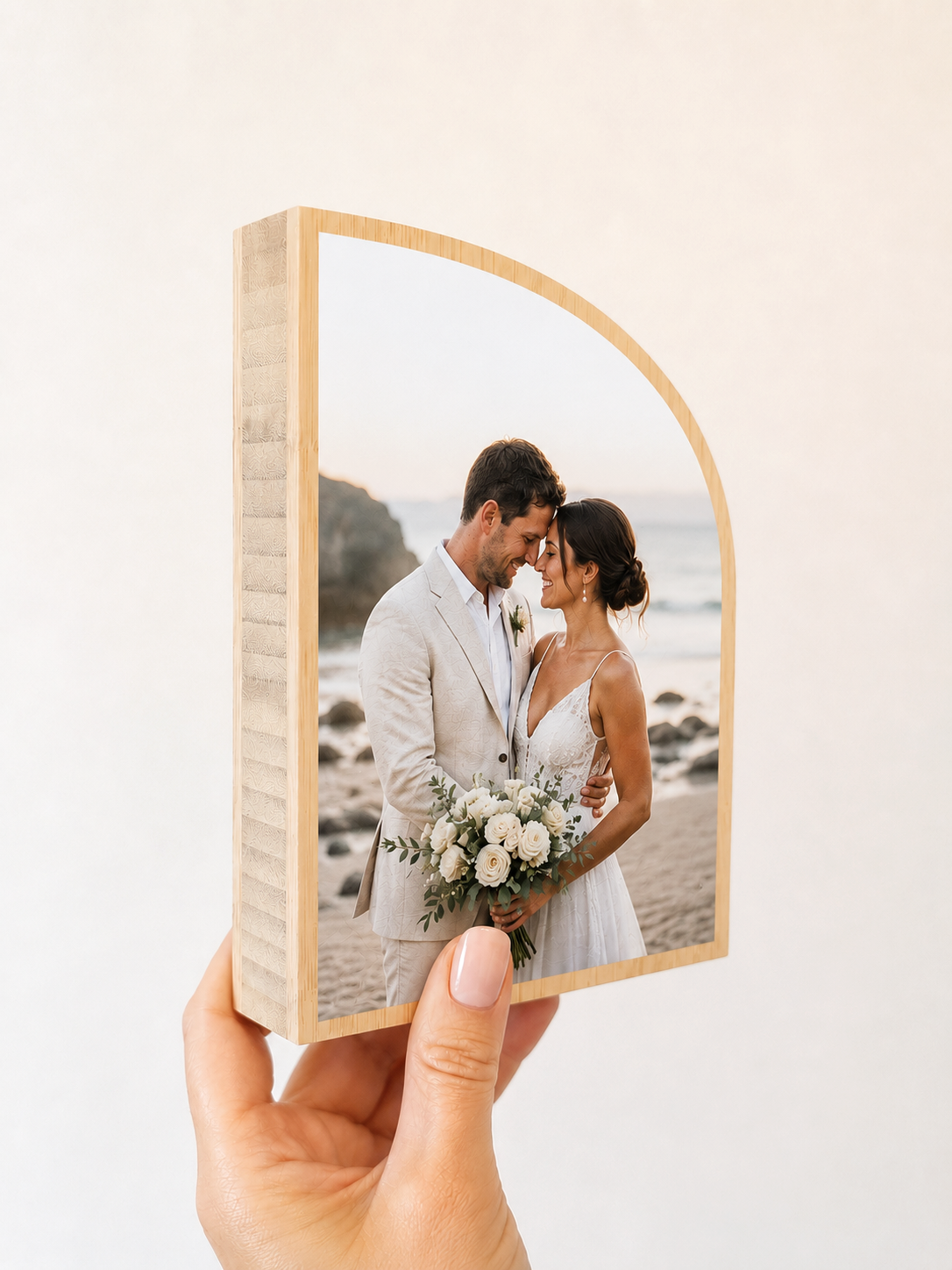 bamboo sail shape photo block in hand 2.png