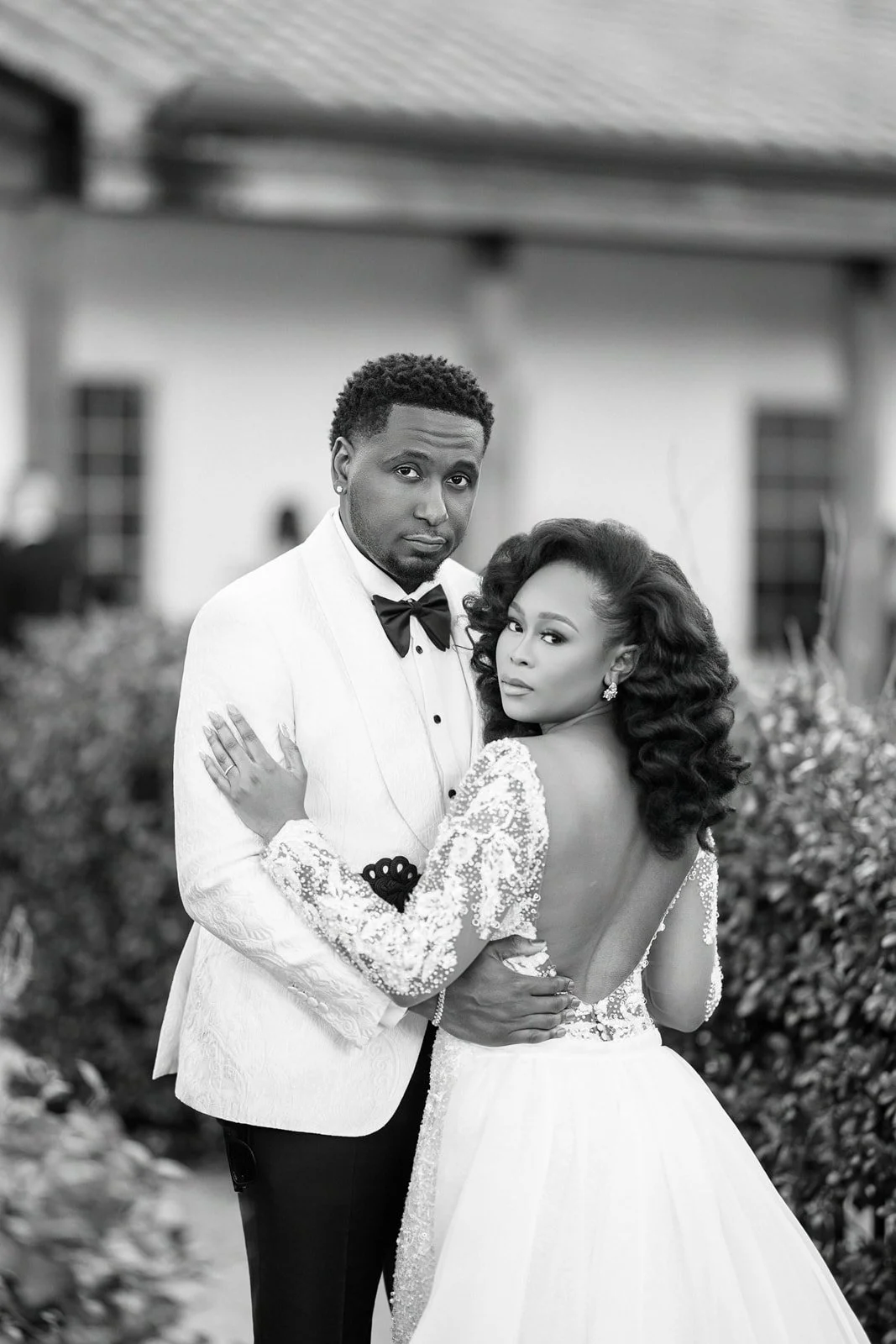 Black and white portrait of a bride and groom, photographed by Topflash Photography