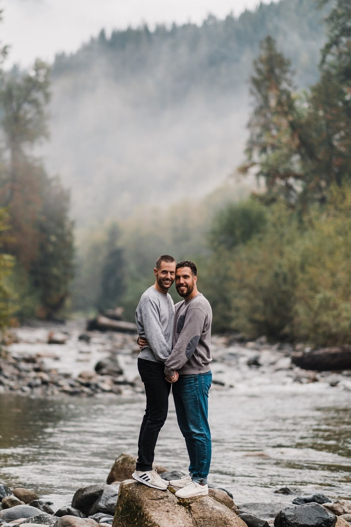 Rainy Engagement Photos in the Forest | Between the Pine