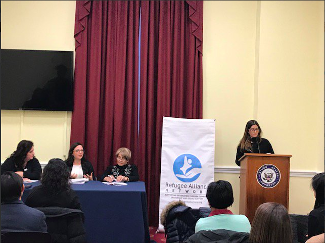 Katie Sgarro, AsylumConnect Co-Founder & President (far left), moderating the panel. Photo Credit: Refugee Alliance Network. 