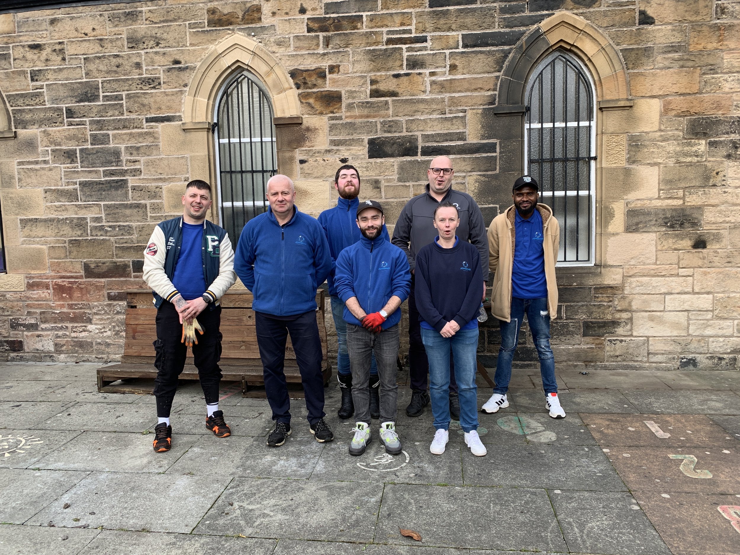 Volunteers from JS Group came to help with cleaning and gardening at the Gorgie Mem