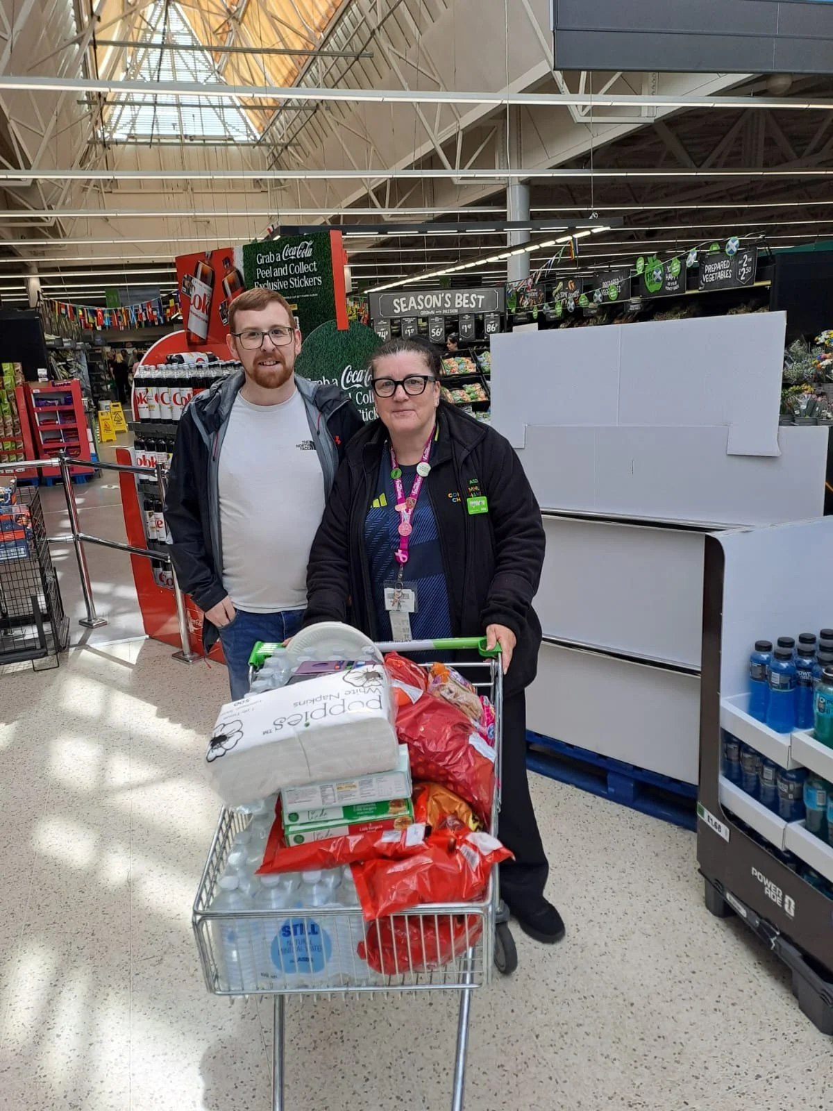 Asda Irvine community champion Ruby Morgan with Chris